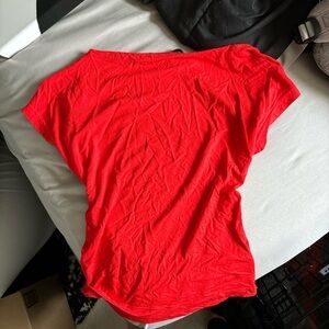 backless red shirt